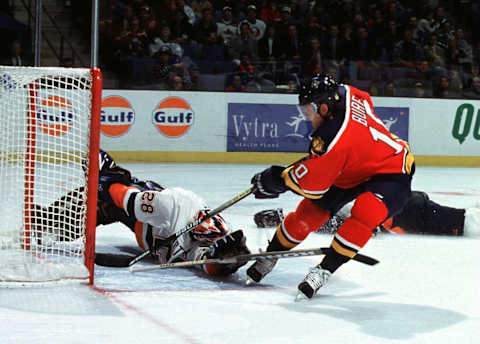 2000 Season: Pavel Bure in his first game as a Florida Panther beats Felix Potvin of the Islanders on a breakaway. (Photo by John Giamundo/Getty Images)