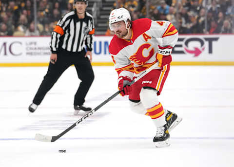 PITTSBURGH, PENNSYLVANIA – OCTOBER 14: Rasmus Andersson #4 of the Calgary Flames skates with the puck during the second period against the Pittsburgh Penguins at PPG PAINTS Arena on October 14, 2023 in Pittsburgh, Pennsylvania. (Photo by Jason Mowry/Getty Images)