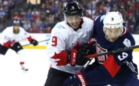 Sep 9, 2016; Columbus, OH, USA; Team Canada forward Matt Duchene (9) battles Team USA defenseman Jack Johnson (3) for the puck in the first period during a World Cup of Hockey pre-tournament game at Nationwide Arena. Mandatory Credit: Aaron Doster-USA TODAY Sports