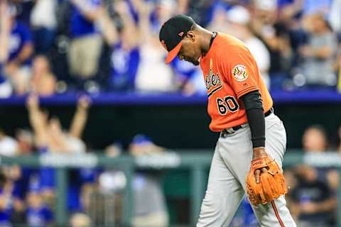 KANSAS CITY, MO – SEPTEMBER 1: Mychal Givens #60 of the Baltimore Orioles looks down in dejection after giving up a walk-off home run to Whit Merrifield #15 of the Kansas City Royals during the ninth inning at Kauffman Stadium on September 1, 2018 in Kansas City, Missouri. (Photo by Brian Davidson/Getty Images)