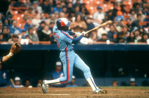 FLUSHING, NY – APRIL 19: Andre Dawson #10 of the Montreal Expos swings at the pitch during an MLB game against the New York Mets on April 19, 1984 at Shea Stadium in Flushing, New York. (Photo by Bruce Bennett Studios/Getty Images)