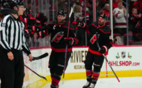 Nov 30, 2023; Raleigh, North Carolina, USA; Carolina Hurricanes center Jordan Staal (11) celebrates his goal against the New York Islanders during the second period at PNC Arena. Mandatory Credit: James Guillory-USA TODAY Sports