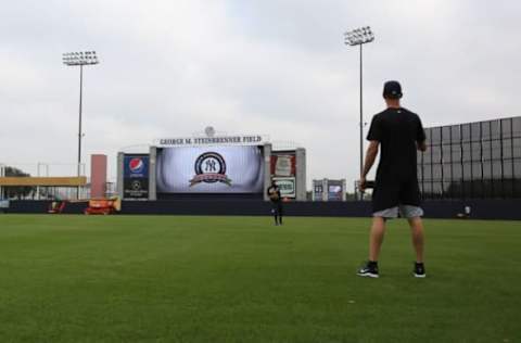 Feb 14, 2017; Tampa, FL, USA; New York Yankees starting pitcher CC Sabathia (52) and relief pitcher Chasen Shreve (45) works out as pitchers and catchers report for spring training at George M. Steinbrenner Field. Mandatory Credit: Kim Klement-USA TODAY Sports