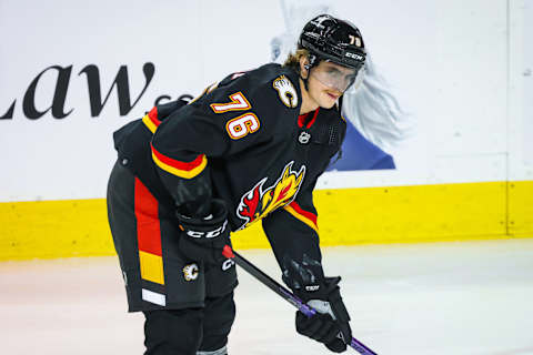 Nov 18, 2023; Calgary, Alberta, CAN; Calgary Flames center Martin Pospisil (76) skates during the warmup period against the New York Islanders at Scotiabank Saddledome. Mandatory Credit: Sergei Belski-USA TODAY Sports