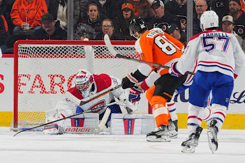 PHILADELPHIA, PA – MARCH 28: Cayden Primeau #30 of the Montreal Canadiens makes a save in front of Joel Farabee #86 of the Philadelphia Flyers in the first period at the Wells Fargo Center on March 28, 2023 in Philadelphia, Pennsylvania. (Photo by Mitchell Leff/Getty Images)