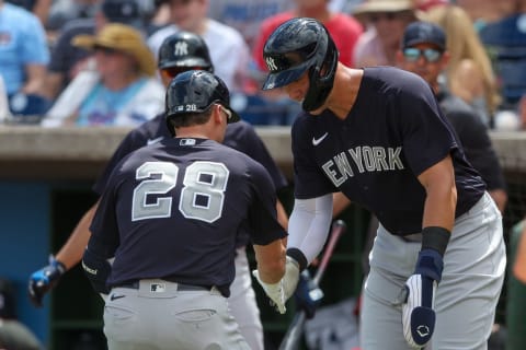 Mar 25, 2023; Clearwater, Florida, USA; New York Yankees center fielder Aaron Judge (99) congratulates third baseman Josh Donaldson (28) after hitting a two-run home run against the Philadelphia Phillies in the first inning during spring training at BayCare Ballpark. Mandatory Credit: Nathan Ray Seebeck-USA TODAY Sports