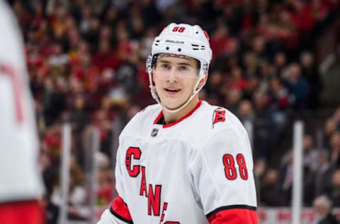 CHICAGO, IL – NOVEMBER 19: Carolina Hurricanes right wing Martin Necas (88) skates to his bench after scoring in the first period during an NHL hockey game between the Carolina Hurricanes and the Chicago Blackhawks on November 19, 2019, at the United Center in Chicago, IL. (Photo By Daniel Bartel/Icon Sportswire via Getty Images)