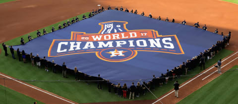 HOUSTON, TX – APRIL 02: Houston Astros unfurl a World Champion banner at Minute Maid Park on April 2, 2018 in Houston, Texas. (Photo by Bob Levey/Getty Images)