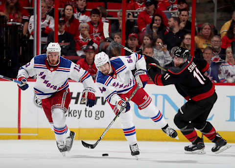 RALEIGH, NC – OCTOBER 07: Adam McQuaid #54 of the New York Rangers passes the puck during an NHL game against the Carolina Hurricanes on October 7, 2018 at PNC Arena in Raleigh, North Carolina. (Photo by Gregg Forwerck/NHLI via Getty Images)