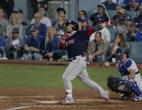 LOS ANGELES – OCTOBER 28: Boston Red Sox player Steve Pearce hits a home run in the eighth inning. The Los Angeles Dodgers host the Boston Red Sox in Game 5 of the World Series at Dodger Stadium in Los Angeles on Oct. 28, 2018. (Photo by Barry Chin/The Boston Globe via Getty Images)