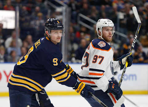 Mar 4, 2019; Buffalo, NY, USA; Buffalo Sabres center Jack Eichel (9) and Edmonton Oilers center Connor McDavid (97) look for a loose puck during the first period at KeyBank Center. Mandatory Credit: Timothy T. Ludwig-USA TODAY Sports