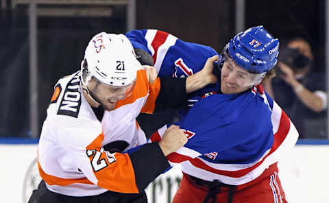 Kevin Rooney #17 of the New York Rangers fights during the second period at Madison Square GardenPhoto by Bruce Bennett/Getty Images)