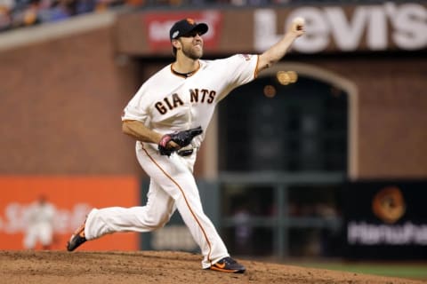 Oct 10, 2016; San Francisco, CA, USA; San Francisco Giants starting pitcher Madison Bumgarner (40) pitches against the Chicago Cubs in the fifth inning in game three of the 2016 NLDS playoff baseball series at AT&T Park. Mandatory Credit: Kelley L Cox-USA TODAY Sports