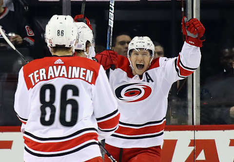 NEW YORK, NY – NOVEMBER 16: Jeff Skinner #53 of the Carolina Hurricanes celebrates a second period goal by Noah Hanifin #5 against Thomas Greiss #1 of the New York Islanders at the Barclays Center on November 16, 2017 in the Brooklyn borough of New York City. (Photo by Bruce Bennett/Getty Images)