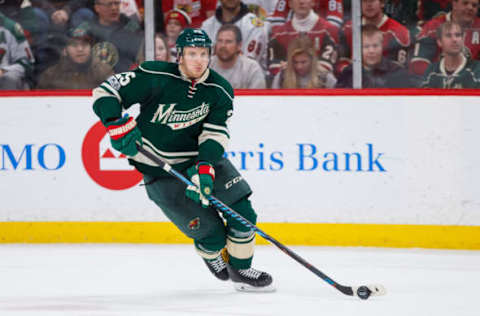 Feb 21, 2017; Saint Paul, MN, USA; Minnesota Wild defenseman Jonas Brodin (25) skates with the puck in the third period against the Chicago Blackhawks at Xcel Energy Center. The Chicago Blackhawks beat the Minnesota Wild 5-3. Mandatory Credit: Brad Rempel-USA TODAY Sports