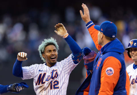 NEW YORK, NEW YORK – APRIL 19: Francisco Lindor #12 of the New York Mets celebrates with teammates after hitting a walk-off single during the tenth inning of the game against the San Francisco Giants at Citi Field on April 19, 2022 in New York City. (Photo by Dustin Satloff/Getty Images)