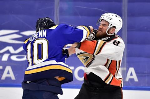 Mar 26, 2021; St. Louis, Missouri, USA; St. Louis Blues center Brayden Schenn (10) fights Anaheim Ducks defenseman Jani Hakanpaa (28) during the first period at Enterprise Center. Mandatory Credit: Jeff Curry-USA TODAY Sports