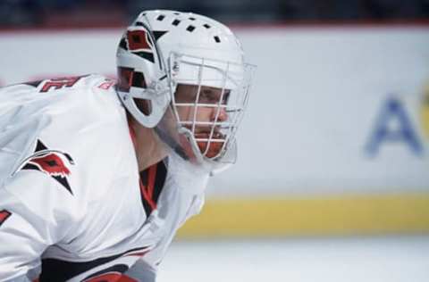 04 Dec 2001: Goaltender Arturs Irbe #1 of the Carolina Hurricanes looks on from the top of the crease against the Buffalo Sabres during the NHL game at the Entertainment and Sports Arena in Raleigh, North Carolina. The Sabres defeated the Hurricanes 4-2. Mandatory Credit: Craig Jones/Getty Images/NHLI