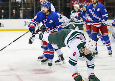 NEW YORK, NY – FEBRUARY 21: New York Rangers Right Wing Mats Zuccarello (36) trips up Minnesota Wild Winger Ryan Donato (6) during the National Hockey League game between the Minnesota Wild and the New York Rangers on February 21, 2019 at Madison Square Garden in New York, NY. (Photo by Joshua Sarner/Icon Sportswire via Getty Images)