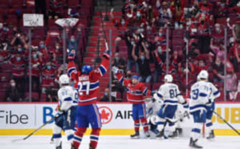 Jul 5, 2021; Montreal, Quebec, CAN; Montreal Canadiens defenseman Alexander Romanov (27) celebrates after scoring a gaol against Tampa Bay Lightning goaltender Andrei Vasilevskiy (88) during the third period in game four of the 2021 Stanley Cup Final at the Bell Centre. Mandatory Credit: Eric Bolte-USA TODAY Sports