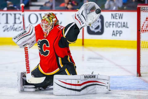 Feb 25, 2016; Calgary, Alberta, CAN; Calgary Flames goalie Joni Ortio (37) makes a save against the New York Islanders during the second period at Scotiabank Saddledome. Mandatory Credit: Sergei Belski-USA TODAY Sports