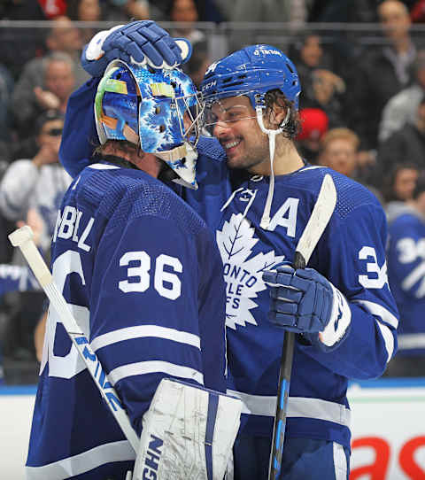 TORONTO, ON – APRIL 26: Auston Matthews #34 and Jack Campbell #36 congratulate each other after Matthews 60th goal and Campbell’s shutout against the Detroit Red Wings during an NHL game at Scotiabank Arena on April 26, 2022, in Toronto, Ontario, Canada. The Toronto Maple Leafs defeated the Red Wings 3-0. (Photo by Claus Andersen/Getty Images)