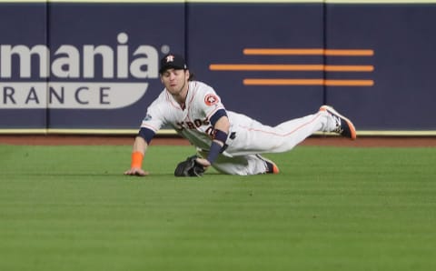 HOUSTON, TX – OCTOBER 18: Houston Astros’ Josh Redddick catches a fly ball hit by Red Sox player Mookie Betts in the ninth inning. The Houston Astros host the Boston Red Sox in Game Four of the ALCS at Minute Maid Park in Houston, TX on Oct. 17, 2018. (Photo by Barry Chin/The Boston Globe via Getty Images)