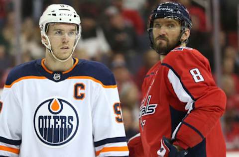 WASHINGTON, DC – NOVEMBER 12: Edmonton Oilers center Connor McDavid (97) and Washington Capitals left wing Alex Ovechkin (8) in the face-off circle during a NHL game between the Washington Capitals and the Edmonton Oilers on November 12, 2017, at Capital One Arena, in Washington D.C.The Capitals defeated the Oilers 2-1 in a shootout(Photo by Tony Quinn/Icon Sportswire via Getty Images)