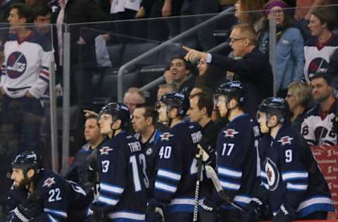 NHL Power Rankings: Winnipeg Jets head coach Paul Maurice and players react to a call from behind the bench during the third period against the San Jose Sharks at MTS Centre. The Sharks won 4-3. Mandatory Credit: Bruce Fedyck-USA TODAY Sports