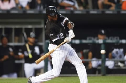 Sep 6, 2016; Chicago, IL, USA; Chicago White Sox shortstop Tim Anderson (12) hits a single against the Detroit Tigers during the first inning at U.S. Cellular Field. Mandatory Credit: Kamil Krzaczynski-USA TODAY Sports