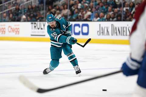 SAN JOSE, CALIFORNIA – APRIL 06: Erik Karlsson #65 of the San Jose Sharks passes the puck against the Colorado Avalanche in the second period at SAP Center on April 06, 2023 in San Jose, California. (Photo by Ezra Shaw/Getty Images)