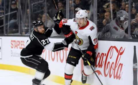 LOS ANGELES, CALIFORNIA – JANUARY 10: Chris Tierney #71 of the Ottawa Senators slides along the boards to avoid Alec Martinez #27 of the Los Angeles Kings during the third period in a 4-1 Senators win at Staples Center on January 10, 2019 in Los Angeles, California. (Photo by Harry How/Getty Images)