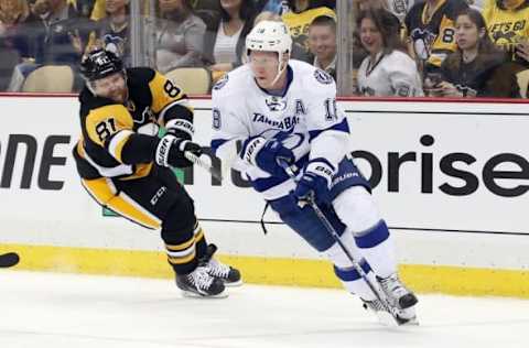 May 13, 2016; Pittsburgh, PA, USA; Tampa Bay Lightning left wing Ondrej Palat (18) skates with the puck as Pittsburgh Penguins right wing Phil Kessel (81) chases during the first period in game one of the Eastern Conference Final of the 2016 Stanley Cup Playoffs at the CONSOL Energy Center. Mandatory Credit: Charles LeClaire-USA TODAY Sports