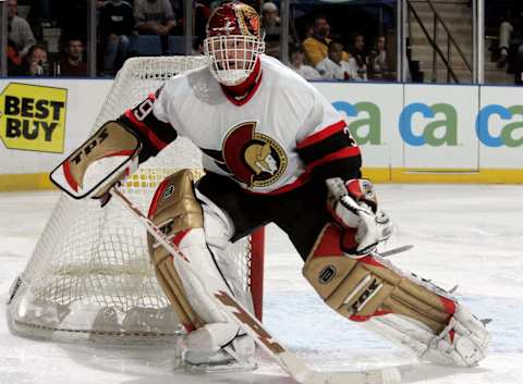 UNIONDALE, NY – NOVEMBER 25: Goaltender Dominik Hasek #39 of the Ottawa Senators looks to play the puck against the New York Islanders during their game on November 25, 2005 at Nassau Coliseum in Uniondale, New York. The Sens defeated the Isles 6-2. (Photo by Jim McIsaac/Getty Images)