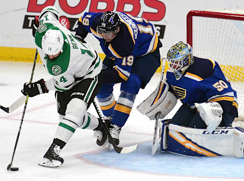 ST. LOUIS, MO – MAY 03: Dallas Stars leftwing Jamie Benn (14) tries to set up a shot on goal while defended by St. Louis Blues defenseman Jay Bouwmeester (19) during game five of a second round NHL Stanley Cup hockey game between the Dallas Stars and the St. Louis Blues, on May 03, 2019, at Enterprise Center, St. Louis, Mo. (Photo by Keith Gillett/Icon Sportswire via Getty Images)