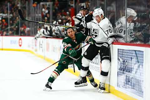 ST. PAUL, MN – OCTOBER 25: Jared Spurgeon (46) of the Minnesota Wild checks Tanner Pearson (70) of the Los Angeles Kings against the boards during the game between the Los Angeles Kings and the Minnesota Wild on October 25 2018 at Xcel Energy Center in St. Paul, Minnesota. The Minnesota Wild defeated the Los Angeles Kings 4-1. (Photo by David Berding/Icon Sportswire via Getty Images)