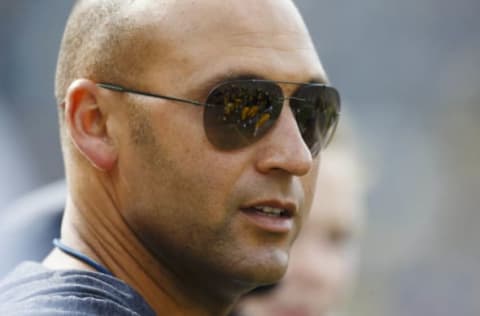 Sep 26, 2015; Ann Arbor, MI, USA; New York Yankees former player Derek Jeter on the sideline prior to the game between the Michigan Wolverines and the Brigham Young Cougars at Michigan Stadium. Mandatory Credit: Rick Osentoski-USA TODAY Sports