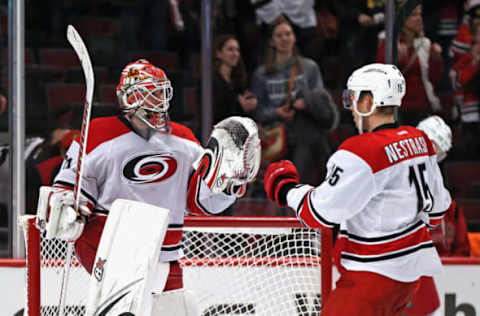 CHICAGO, IL – DECEMBER 27: Eddie Lack #31 of the Carolina Hurricanes (L) celebrates a win over the Chicago Blackhawks with teammate Andrej Nestrasil #15 at the United Center on December 27, 2015 in Chicago, Illinois. The Hurricanes defeated the Blackhawks 2-1. (Photo by Jonathan Daniel/Getty Images)