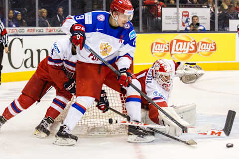 TORONTO , ON – DECEMBER 31: Goaltender Miroslav Svoboda #1 of Czech Republic makes a phenomenal save against forward Pavel Buchnevich #19 of Russia during the 2015 IIHF World Junior Championship on December 31, 2014 at the Air Canada Centre in Toronto, Ontario, Canada. (Photo by Dennis Pajot/Getty Images)