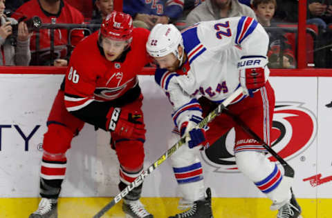 RALEIGH, NC – FEBRUARY 19: Teuvo Teravainen #86 of the Carolina Hurricanes battles Kevin Shattenkirk #22 of the New York Rangers during an NHL game on February 19, 2019 at PNC Arena in Raleigh, North Carolina. (Photo by Karl DeBlaker/NHLI via Getty Images)