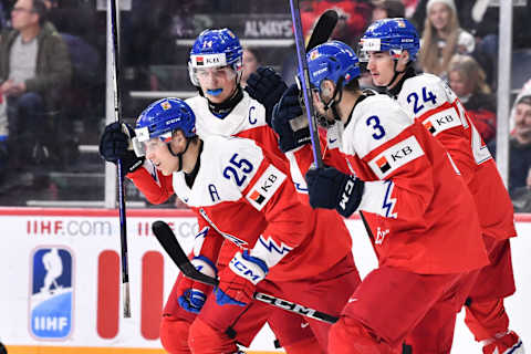 HALIFAX, CANADA – JANUARY 02: Jiri Kulich #25 of Team Czech Republic celebrates his goal with teammates Stanislav Svozil #14, David Spacek #3 and Matyas Sapovaliv #24 during the first period against Team Switzerland in the quarterfinals of the 2023 IIHF World Junior Championship at Scotiabank Centre on January 2, 2023 in Halifax, Nova Scotia, Canada. (Photo by Minas Panagiotakis/Getty Images)