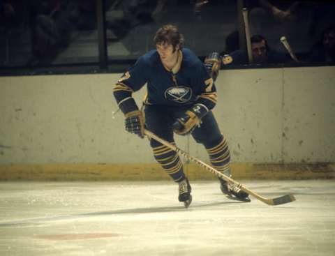 1974: Rick Martin #7 of the Buffalo Sabres skates on the ice during an NHL game circa 1974. (Photo by Melchior DiGiacomo/Getty Images)