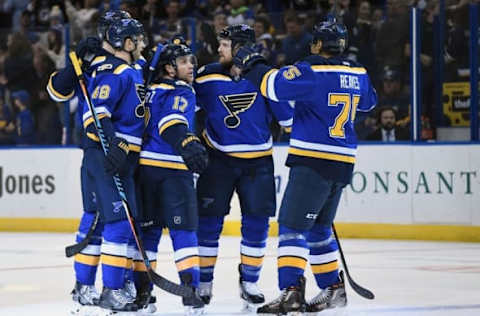 NHL Team Name Origins: St. Louis Blues left wing Jaden Schwartz (17) is congratulated by defenseman Petteri Lindbohm (48) center Kyle Brodziak (28) and right wing Ryan Reaves (75) after scoring his second goal of the game against the San Jose Sharks during the second period at Scottrade Center. Mandatory Credit: Jeff Curry-USA TODAY Sports