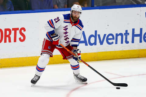 Jun 11, 2022; Tampa, Florida, USA; New York Rangers center Barclay Goodrow (21) controls the puck against the Tampa Bay Lightning in the third period in game six of the Eastern Conference Final of the 2022 Stanley Cup Playoffs at Amalie Arena. Mandatory Credit: Nathan Ray Seebeck-USA TODAY Sports