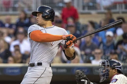 Jun 8, 2016; Minneapolis, MN, USA; Miami Marlins right fielder Giancarlo Stanton (27) hits a RBI single in the fifth inning against the Minnesota Twins at Target Field. Mandatory Credit: Jesse Johnson-USA TODAY Sports