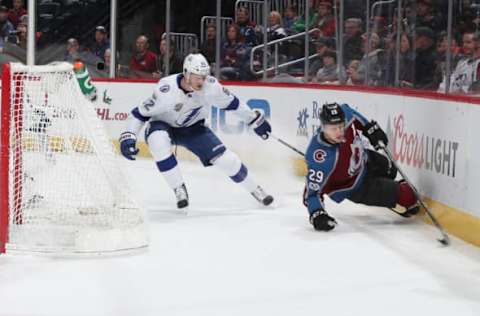 DENVER, CO – DECEMBER 16: Nathan MacKinnon #29 of the Colorado Avalanche skates against Andrej Sustr #62 of the Tampa Bay Lightning at the Pepsi Center on December 16, 2017. (Photo by Michael Martin/NHLI via Getty Images)