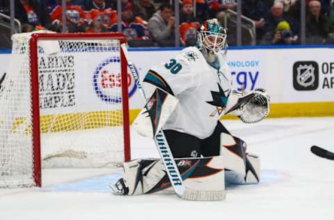 EDMONTON, AB – FEBRUARY 9: San Jose Sharks Goalie Aaron Dell (30) makes a save in the first period during the Edmonton Oilers game versus the San Jose Sharks on February 9, 2019 at Rogers Place in Edmonton, AB. (Photo by Curtis Comeau/Icon Sportswire via Getty Images)