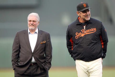 SAN FRANCISCO, CA – JUNE 09: General manager Brian Sabbean and manager Bruce Bocchy stand on the field before a ceremony for Edgar Renteria #16 of the Cincinnati Reds to give him his World Series Championship ring before the Reds played the Giants at AT&T Park on June 9, 2011 in San Francisco, California. (Photo by Ezra Shaw/Getty Images)