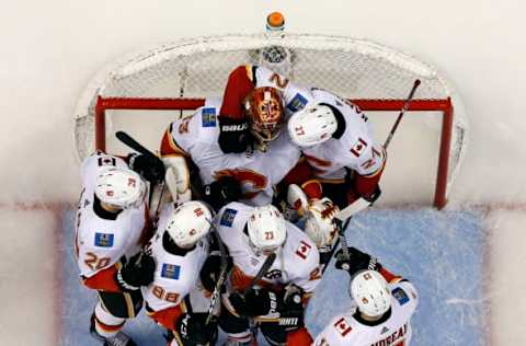 SUNRISE, FL – JANUARY 12: Goaltender David Rittich #33 of the Calgary Flames celebrates their win with teammates against the Florida Panthers at the BB&T Center on January 12, 2018 in Sunrise, Florida. (Photo by Eliot J. Schechter/NHLI via Getty Images)