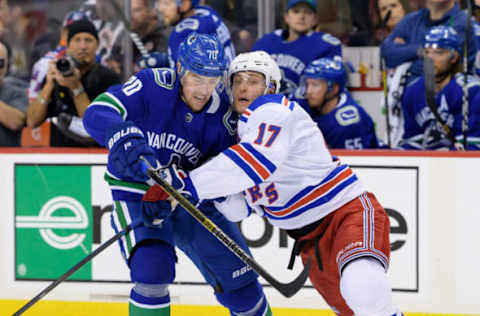 VANCOUVER, BC – MARCH 13: Vancouver Canucks Left Wing Tanner Pearson (70) and New York Rangers Right Wing Jesper Fast (17) battle for position during their NHL game at Rogers Arena on March 13, 2019 in Vancouver, British Columbia, Canada. (Photo by Derek Cain/Icon Sportswire via Getty Images)